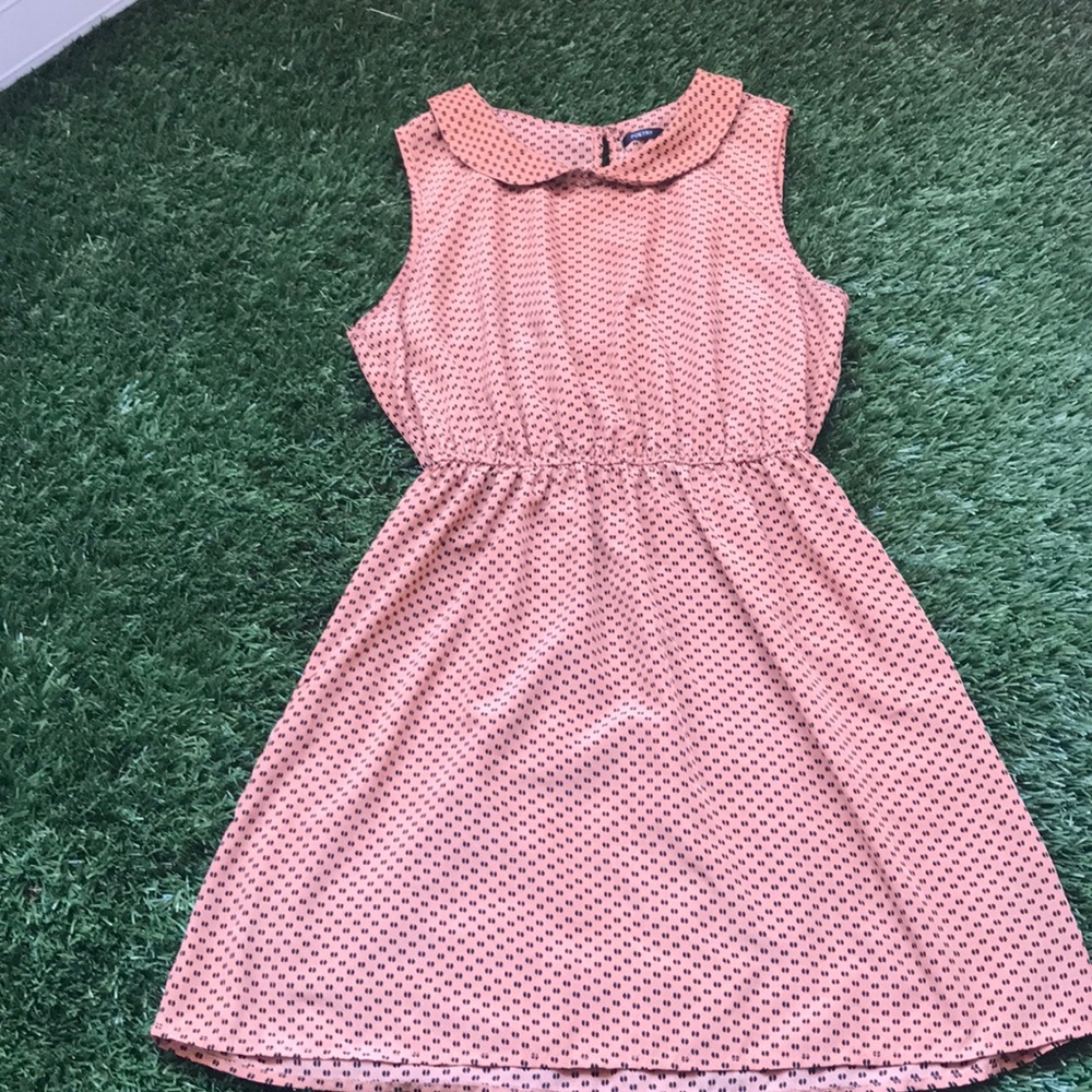 Tan polka dot dress.